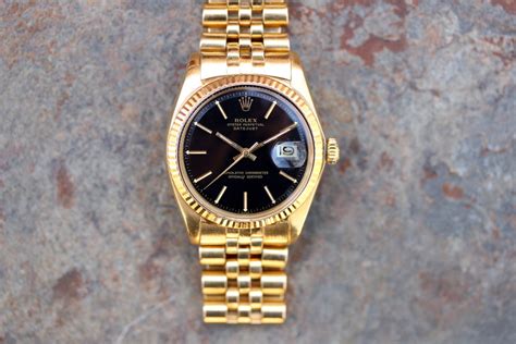 rolex datejust gold black dial